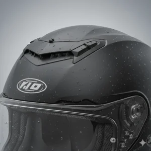 Top view of a motorcycle helmet showing aerodynamic ventilation ports in the closed position to maintain a dry interior during heavy rain.