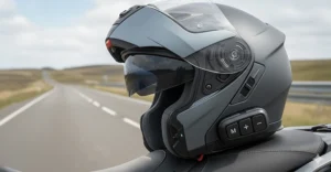 A touring motorcycle helmet featuring an integrated Bluetooth communication system housing for rider-to-pillion intercom.
