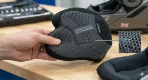 Close-up of a removable, antibacterial moisture-wicking inner liner from a premium summer motorcycle helmet.