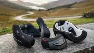 The removable and washable moisture-wicking interior lining of a modern motorcycle helmet, showing the comfort padding designed for long-distance touring.