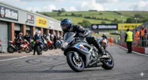 A close-up of a high-strength double-D ring chin strap featuring official Snell M2020 approved labelling on the woven webbing.