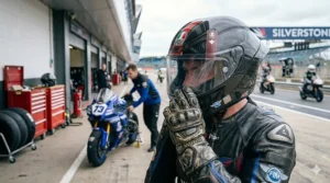 Alt text for image 9: A racer wearing an FIM homologated helmet preparing for a session at a UK track day.
