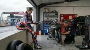 Diagram of the internal cooling channels and exhaust vents in a premium racing helmet to keep riders cool during summer track days.