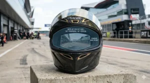 A comparison of the wide peripheral field of vision on a MotoGP standard visor versus a standard road helmet for improved track safety.