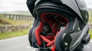 Inside view of a motorcycle helmet showing the neat internal wiring and speaker for the intercom.