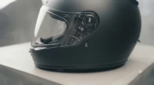 Rear profile of fibreglass motorcycle helmet highlighting active exhaust vents.