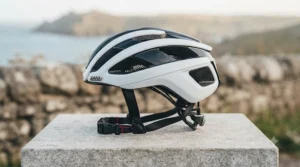 Side profile of the lightweight fibreglass sport helmet highlighting its aerodynamic design and safety certification.