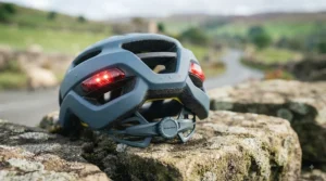 Moisture-wicking inner padding inside a lightweight helmet optimized for multi-day cycling tours.