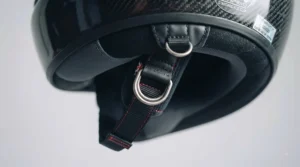 Secure double D-ring fastener and padded chin strap on the featherlight racing helmet.