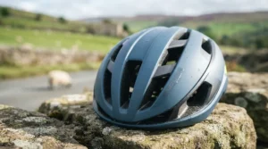 Close-up of airflow vents on a lightweight helmet designed for long-distance bicycle touring and warm weather.