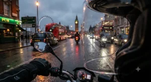 A commuter on a motorcycle navigating a busy London street after dusk, wearing a high-visibility jacket and a helmet equipped with a clear anti-scratch visor.