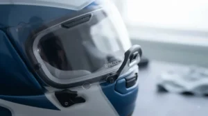 Rider wearing an anti-fog clear visor on a motorbike helmet during a night commute.