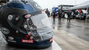 Fitting multiple tear-off laminates for helmet visor clarity during unpredictable British circuit weather conditions